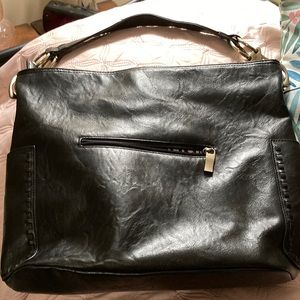 Really nice and in great condition black bag from Europe. Measures 14x12”.
